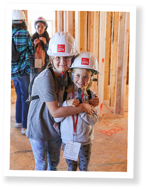 Two children in hard hats
