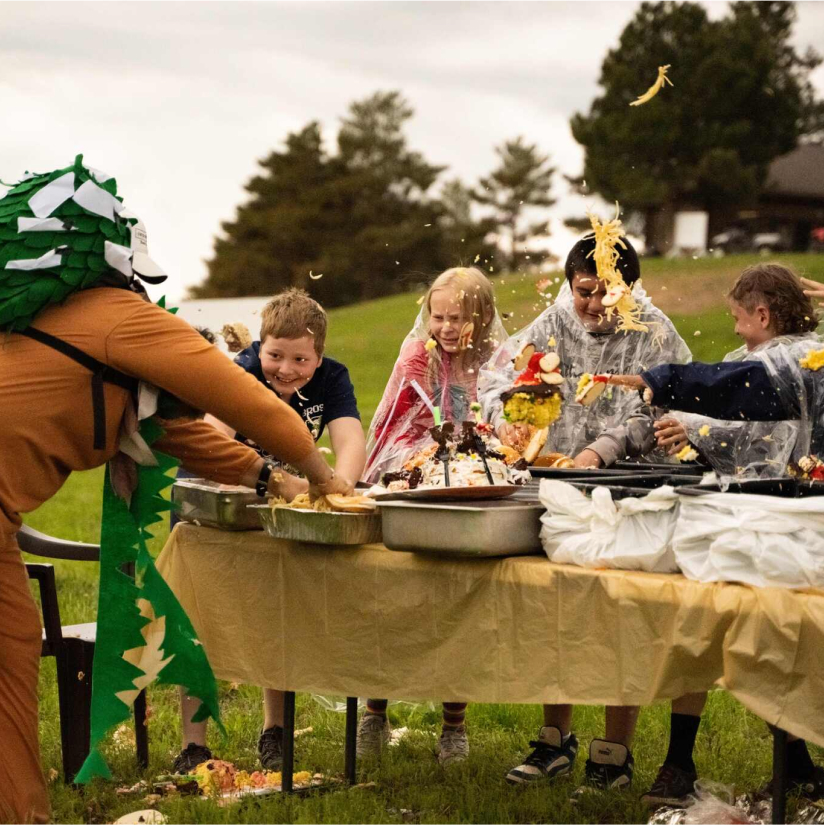 Kids in an outdoor food fight