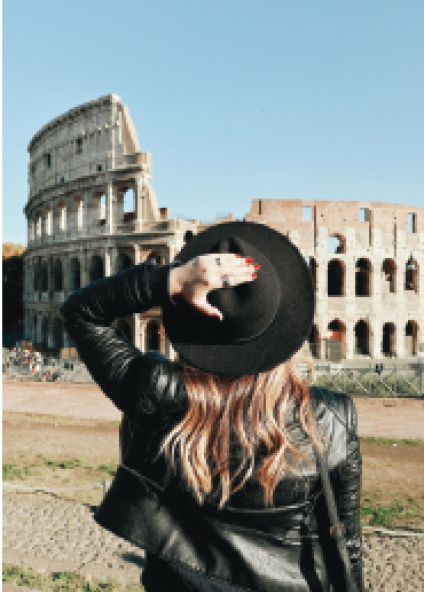 Vacationing woman wearing hat